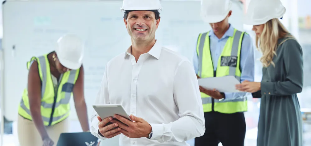 Construction worker wearing full personal protective equipment